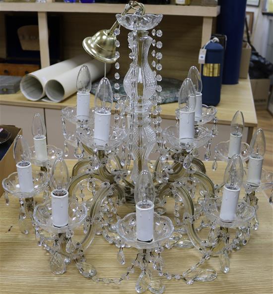 A 20th century cut and moulded glass chandelier, with beaded drops diameter 63cm drop 48cm